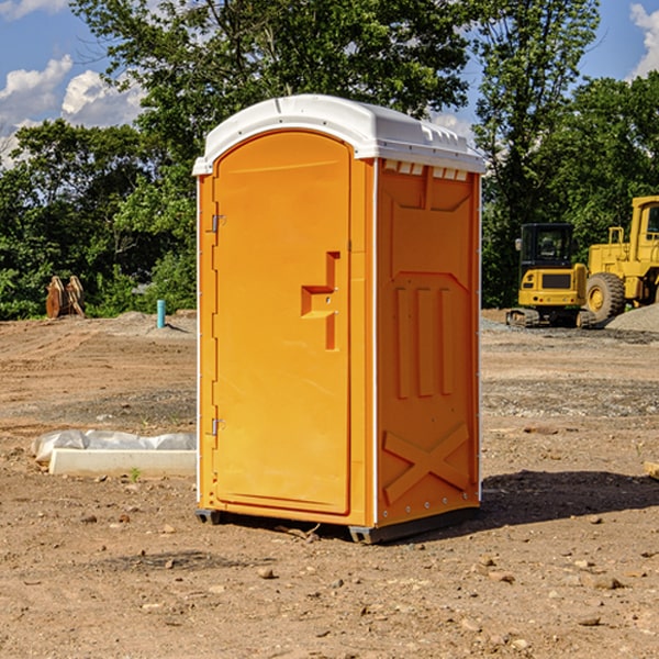 what is the cost difference between standard and deluxe portable toilet rentals in Vinton